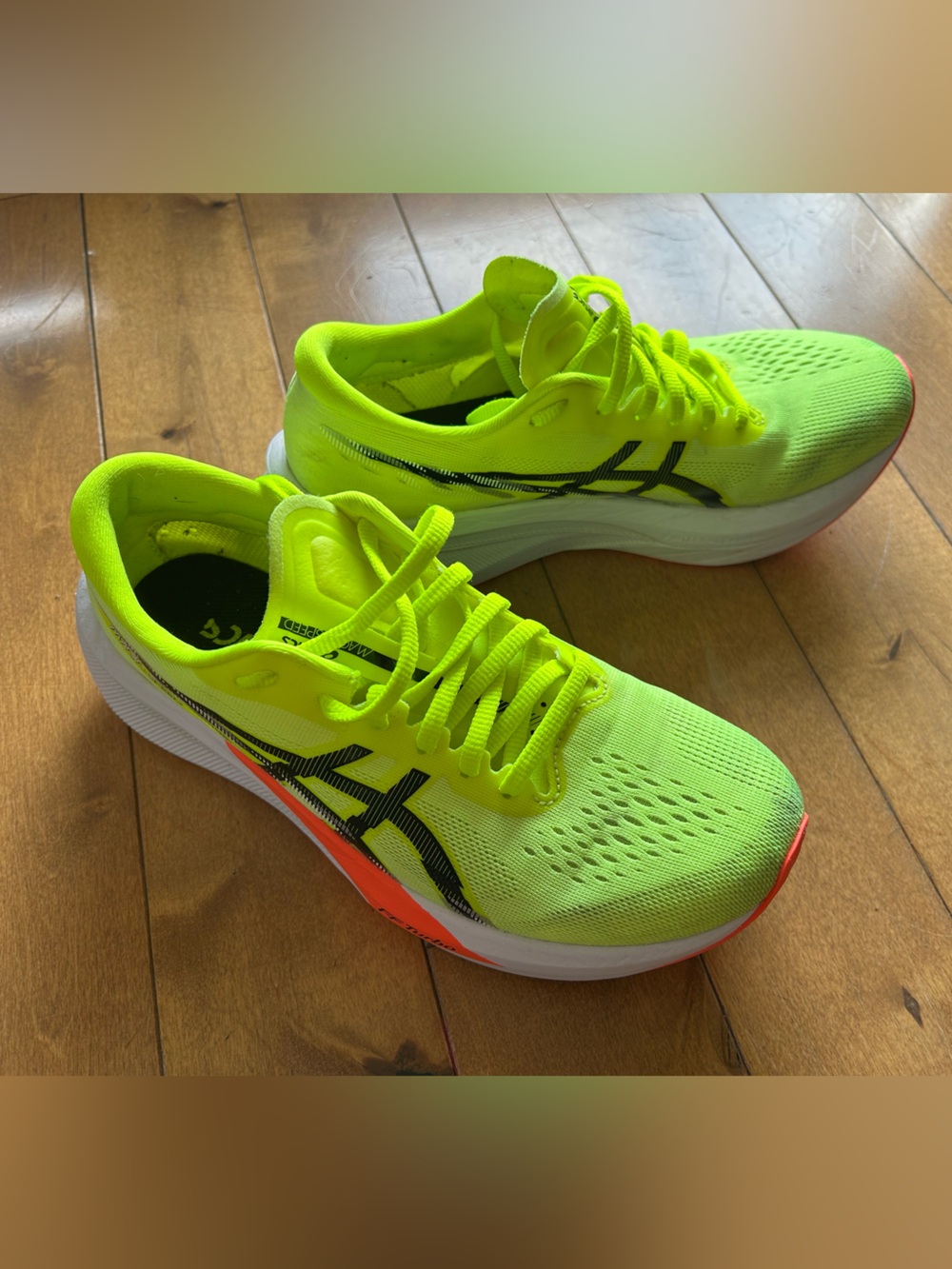 Asics Neon Yellow Running Shoes with Black and Orange Accents
